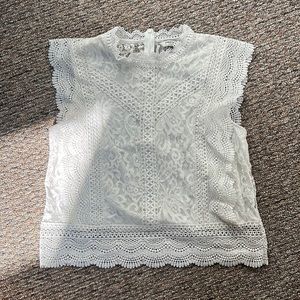 Cute white laced pattern top